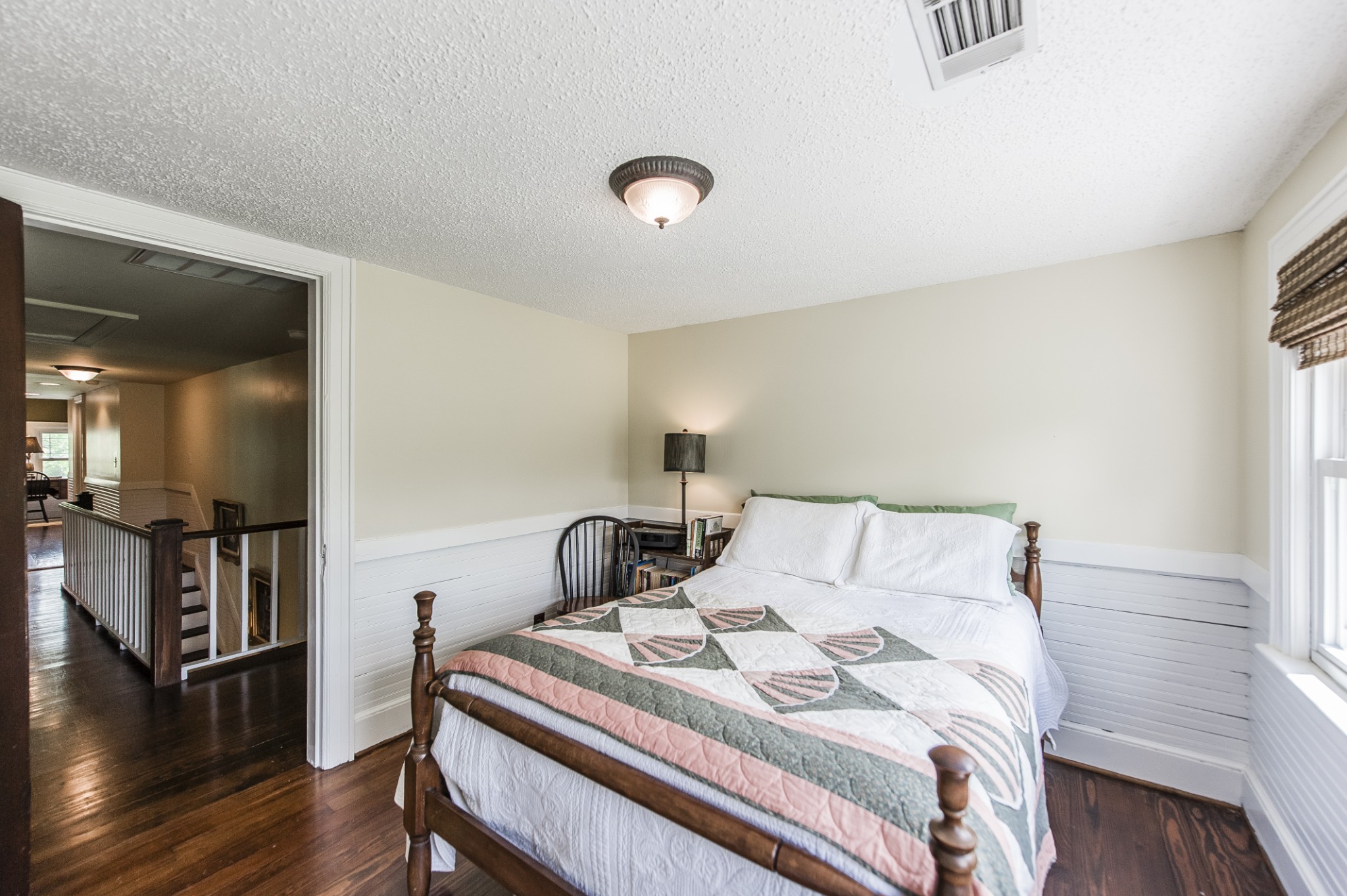 7255 Lebanon Road Lebanon, TN 37087 - Photo 51 of 55 a bedroom with a bed and wooden floor