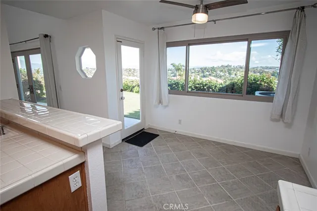 a view of a bathroom with a sink and a mirror