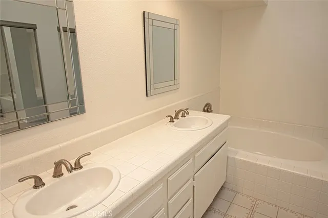 a bathroom with a sink and a bathtub