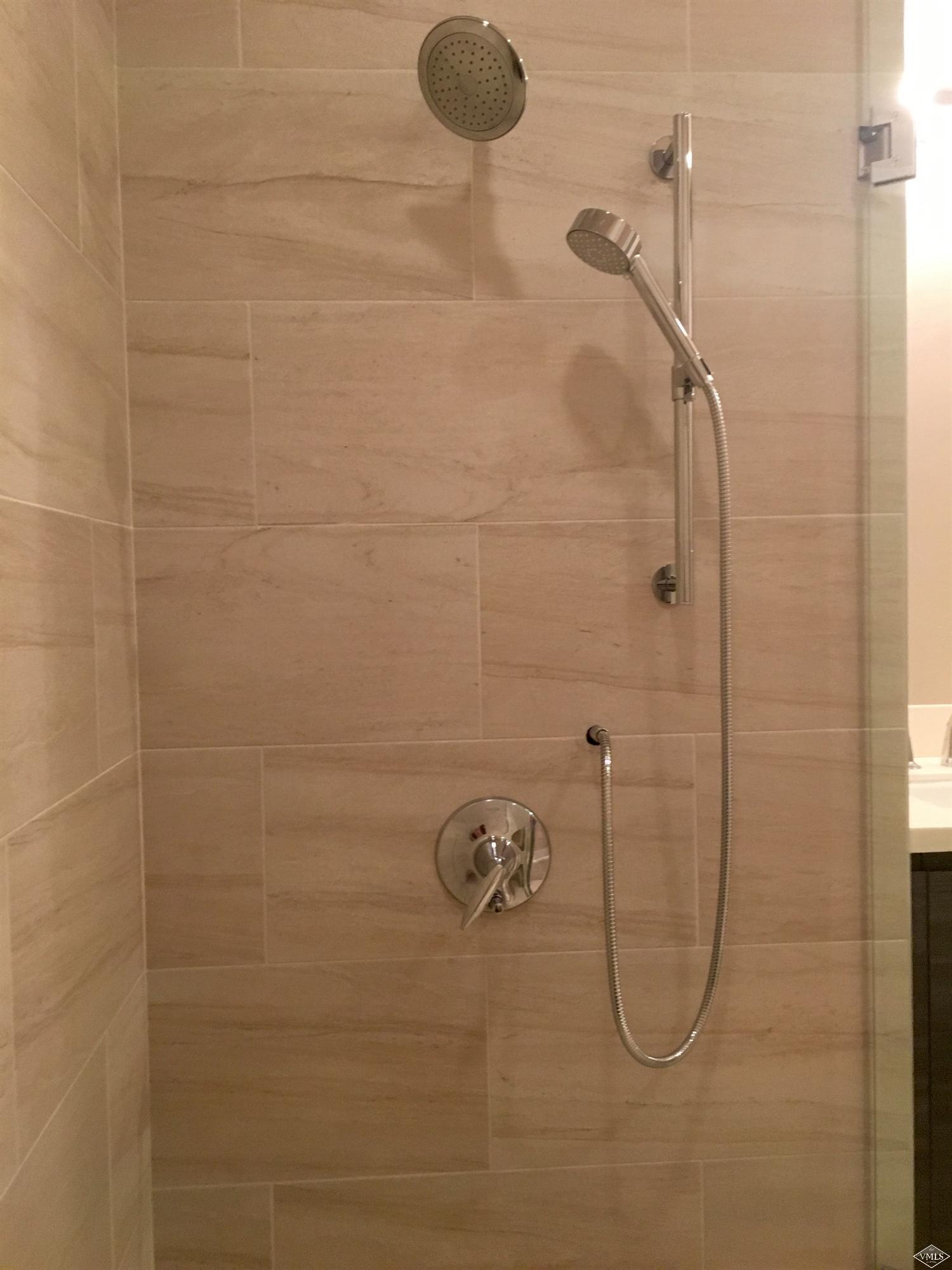 76 Lynx Circle Gypsum, CO 81637 - Photo 12 of 17 a bathroom with a shower and a shower head