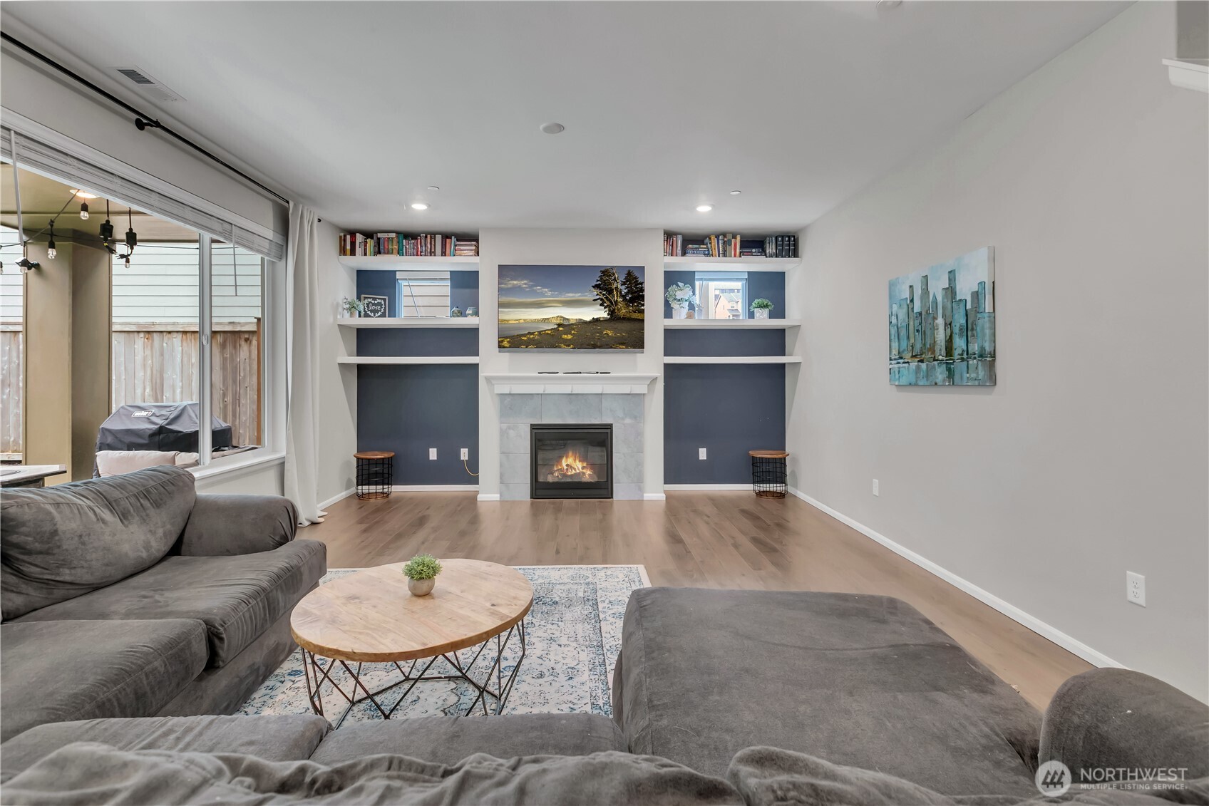 1226 Baker Hts Loop Bremerton, WA 98312 - Photo 14 of 40 a living room with furniture and a fireplace