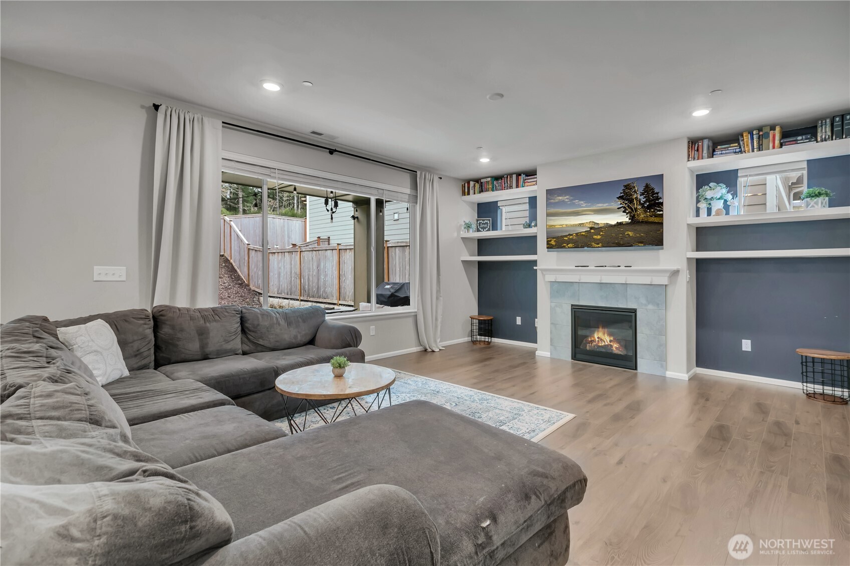 1226 Baker Hts Loop Bremerton, WA 98312 - Photo 15 of 40 a living room with furniture and a fireplace