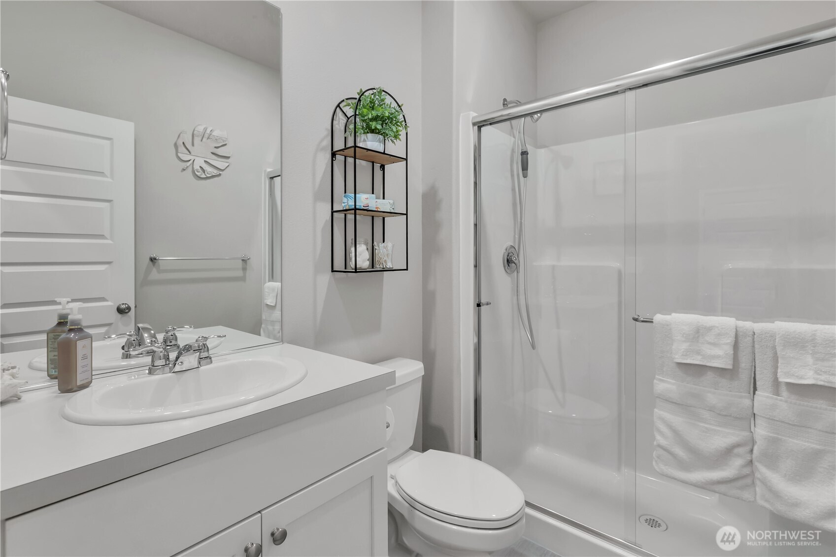 1226 Baker Hts Loop Bremerton, WA 98312 - Photo 18 of 40 a bathroom with a sink toilet and shower