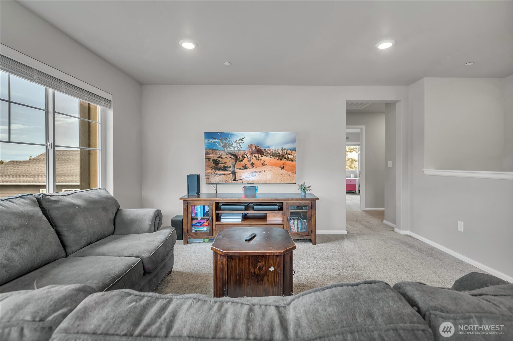 1226 Baker Hts Loop Bremerton, WA 98312 - Photo 21 of 40 a living room with furniture and a flat screen tv