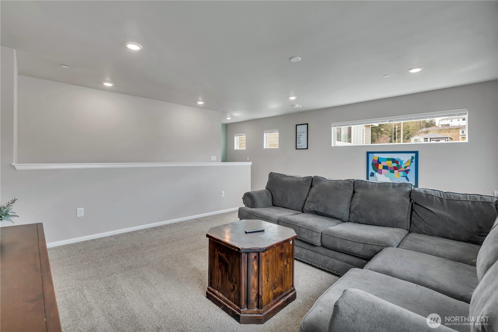 1226 Baker Hts Loop Bremerton, WA 98312 - Photo 22 of 40 a living room with furniture a rug and a window