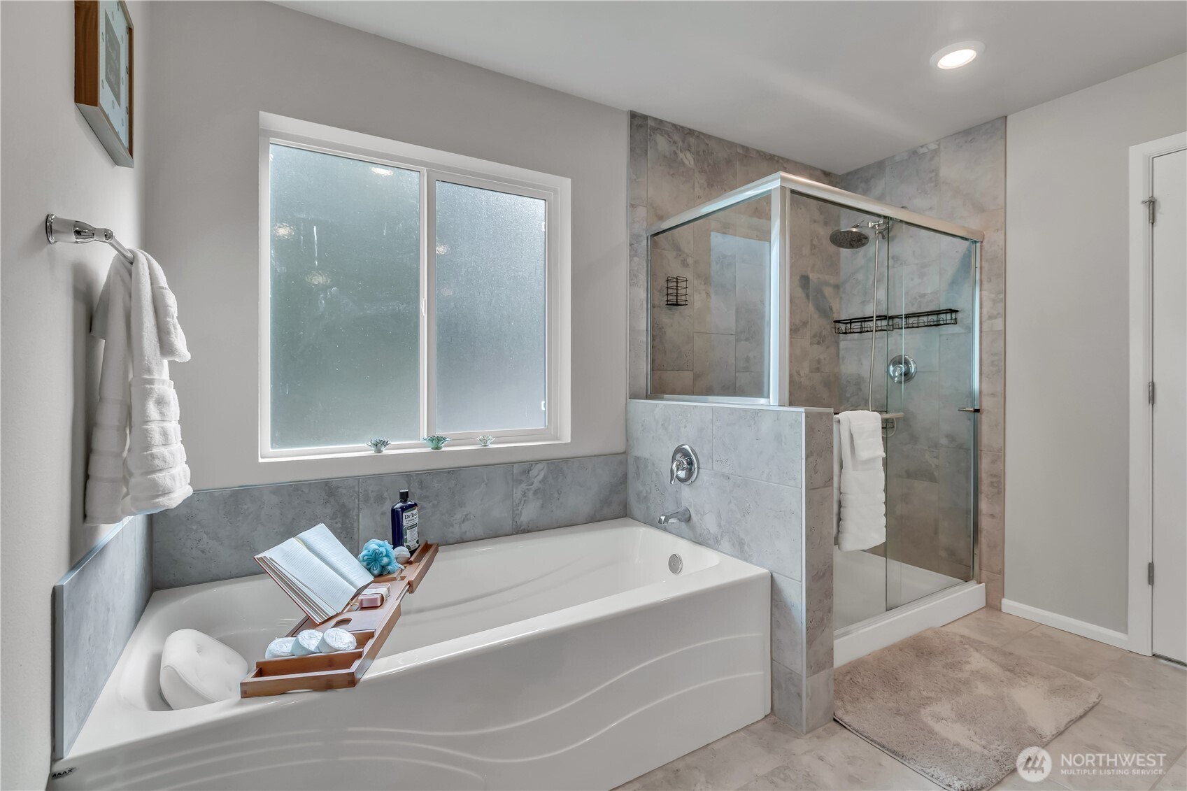 1226 Baker Hts Loop Bremerton, WA 98312 - Photo 26 of 40 a bathroom with a tub shower and mirror