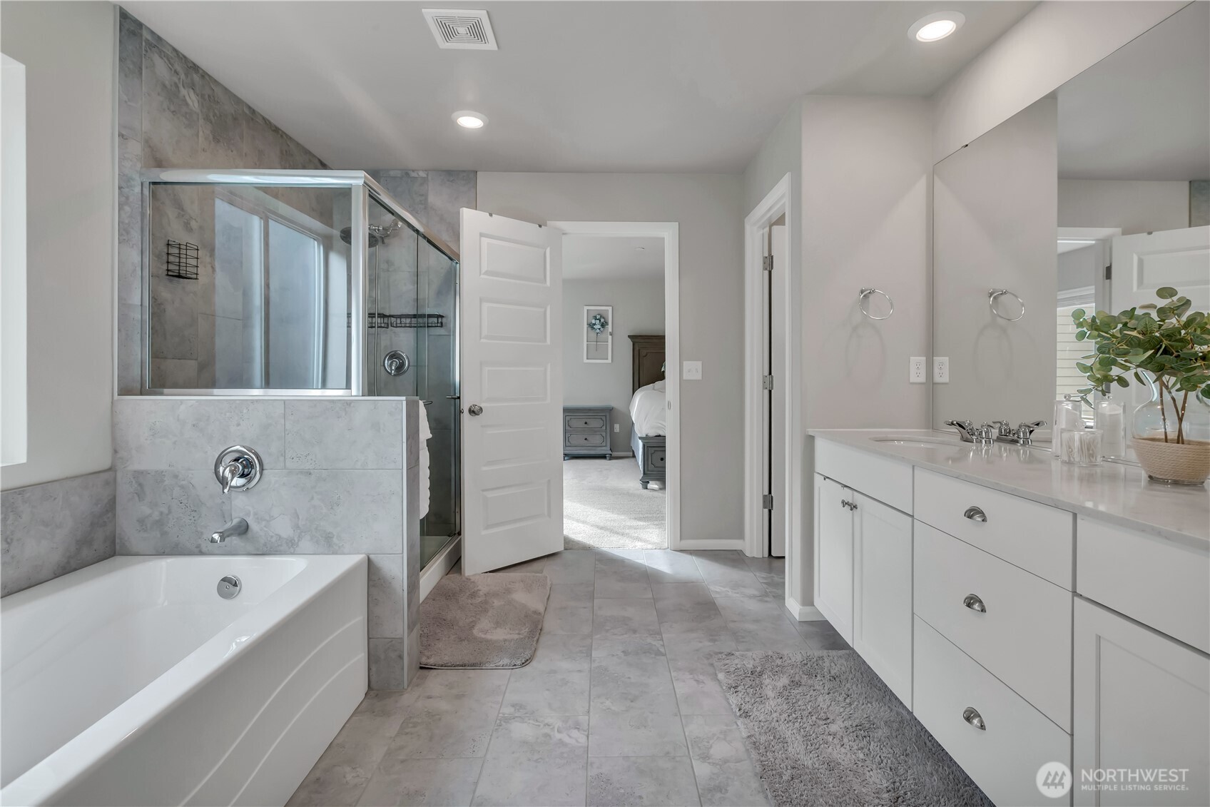 1226 Baker Hts Loop Bremerton, WA 98312 - Photo 27 of 40 a bathroom with a tub sink and mirror