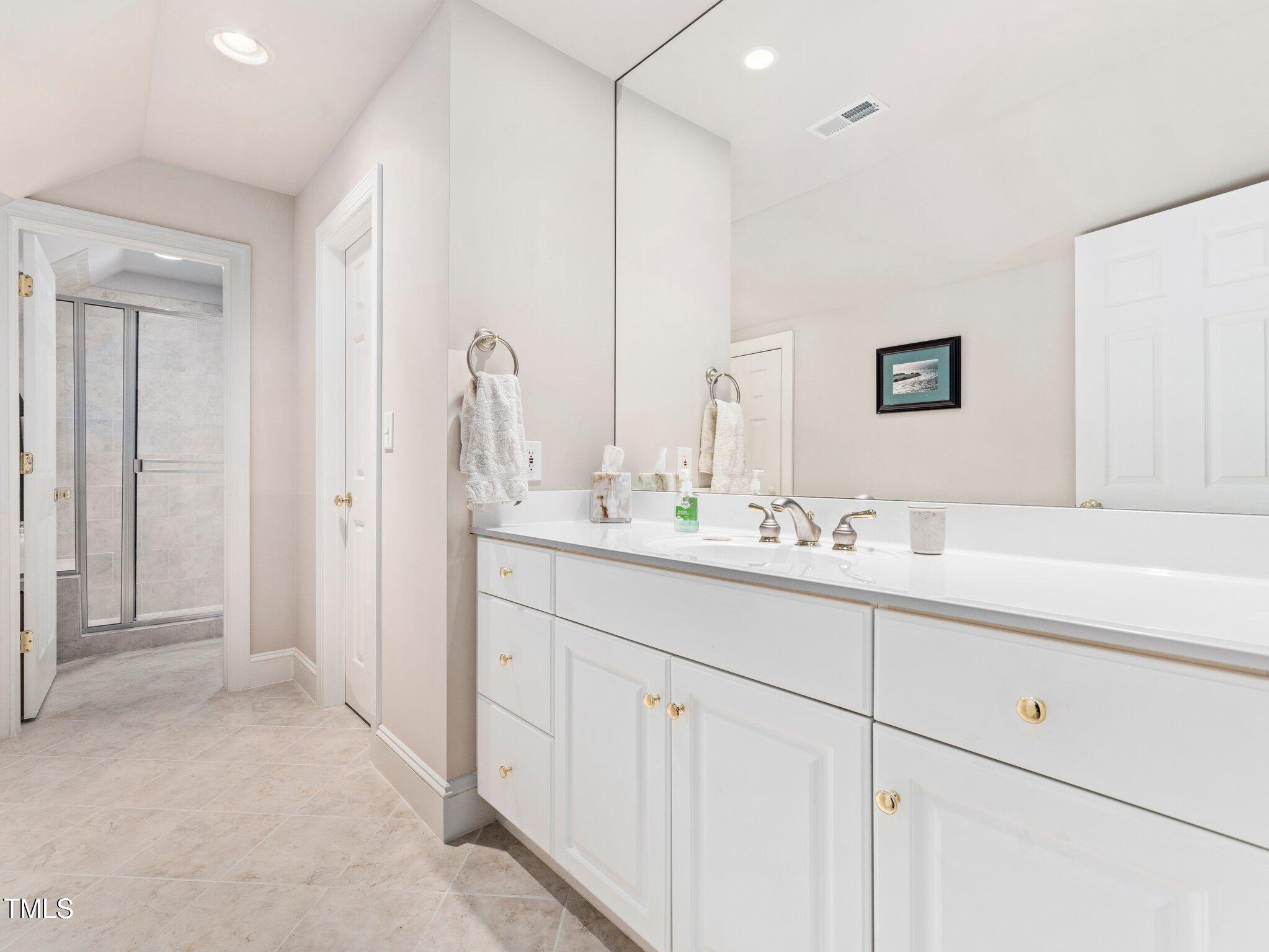 10937 Cahill Road Raleigh, NC 27614 - Photo 41 of 53 2nd Flr Bdrm has Priv Bath w/Mirrored Vanity