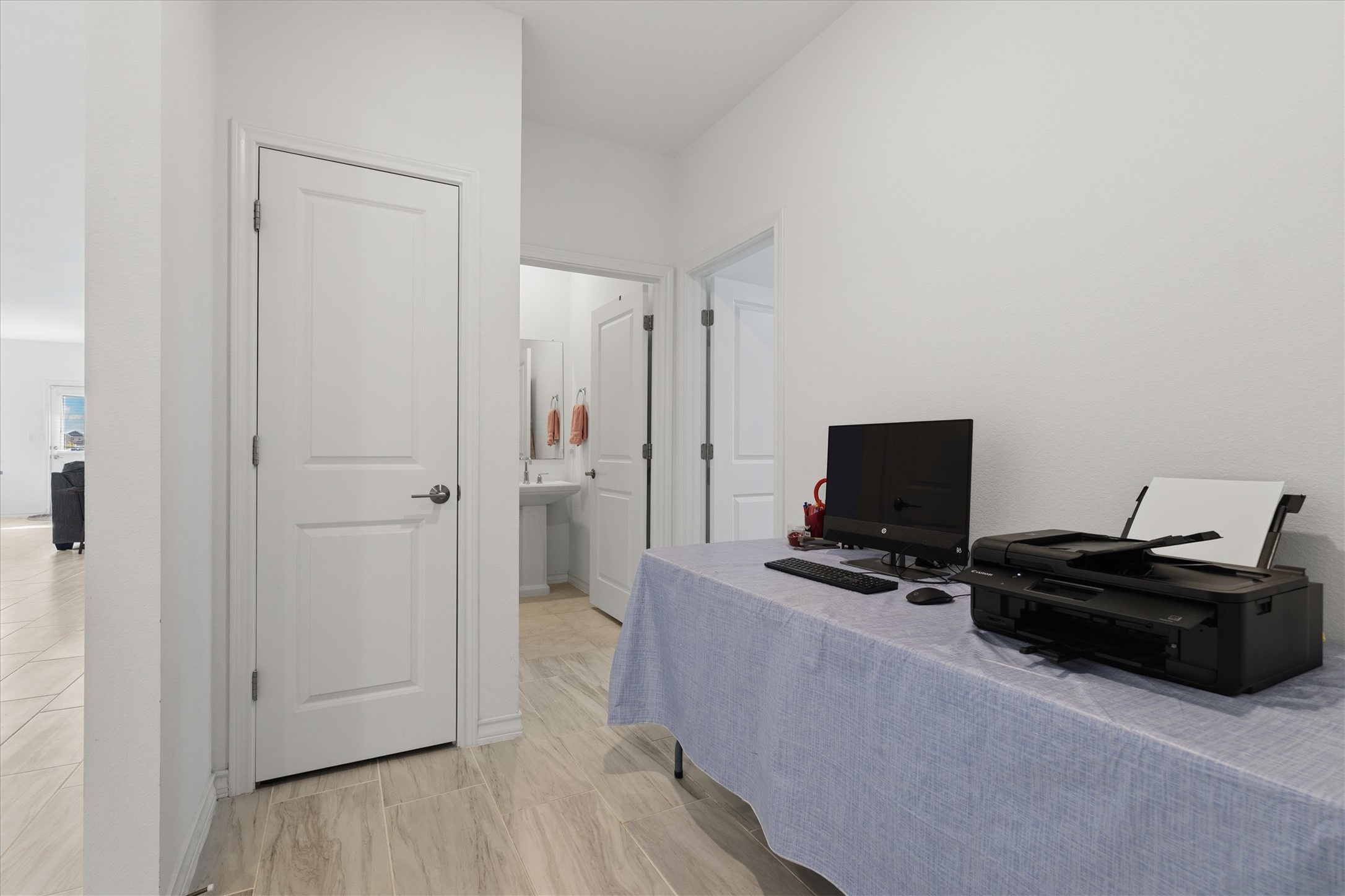 1000 Moose Road Hutto, TX 78634 - Photo 19 of 29 a view of a workspace with furniture and wooden floor