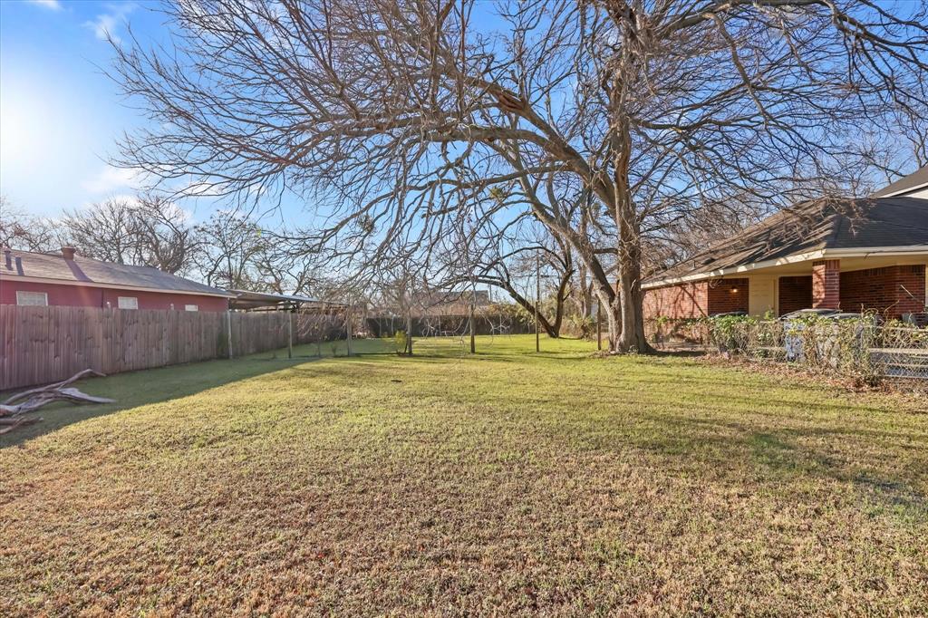 1934 Leath Street Dallas, TX 75212 - Photo 1 of 1 a view of a yard with a house