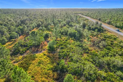 a view of a yard with an outdoor space