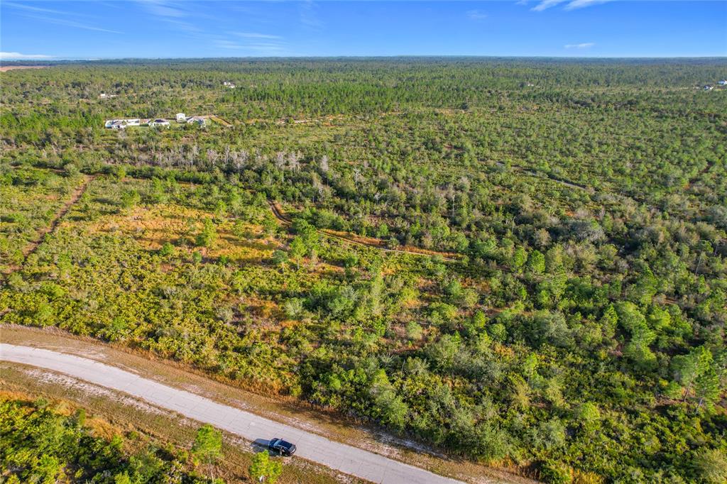 81 Meadow Lark Boulevard Frostproof, FL 33843 - Photo 7 of 19 a view of a field with an outdoor space