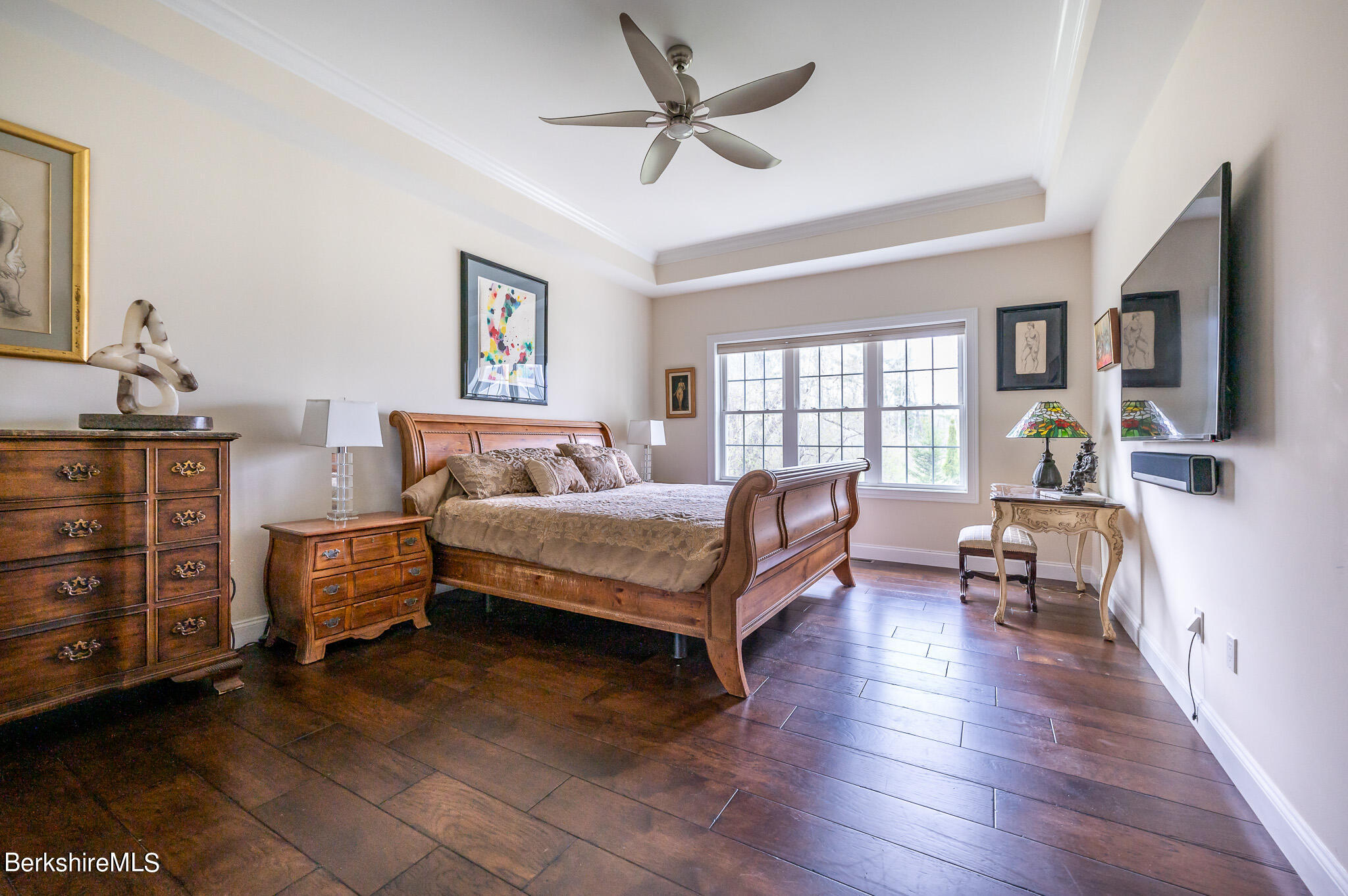 16 Burning Tree Road Great Barrington, MA 01230 - Photo 16 of 39 a bedroom with a bed and wooden floor