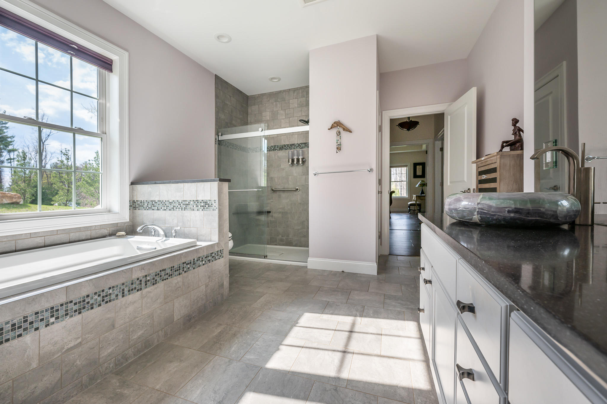 16 Burning Tree Road Great Barrington, MA 01230 - Photo 18 of 39 a bathroom with a granite countertop sink and a tub