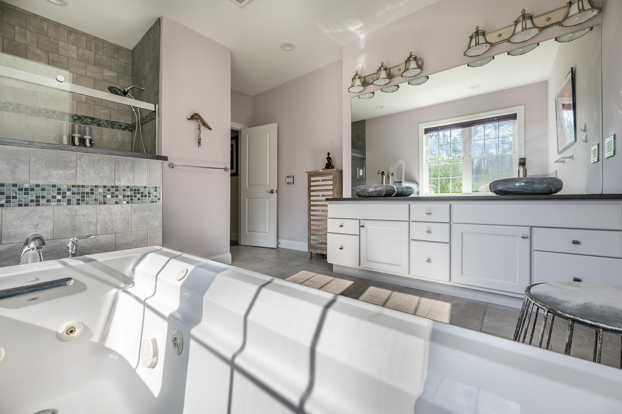 16 Burning Tree Road Great Barrington, MA 01230 - Photo 19 of 39 a bedroom with a bed and a dresser in it