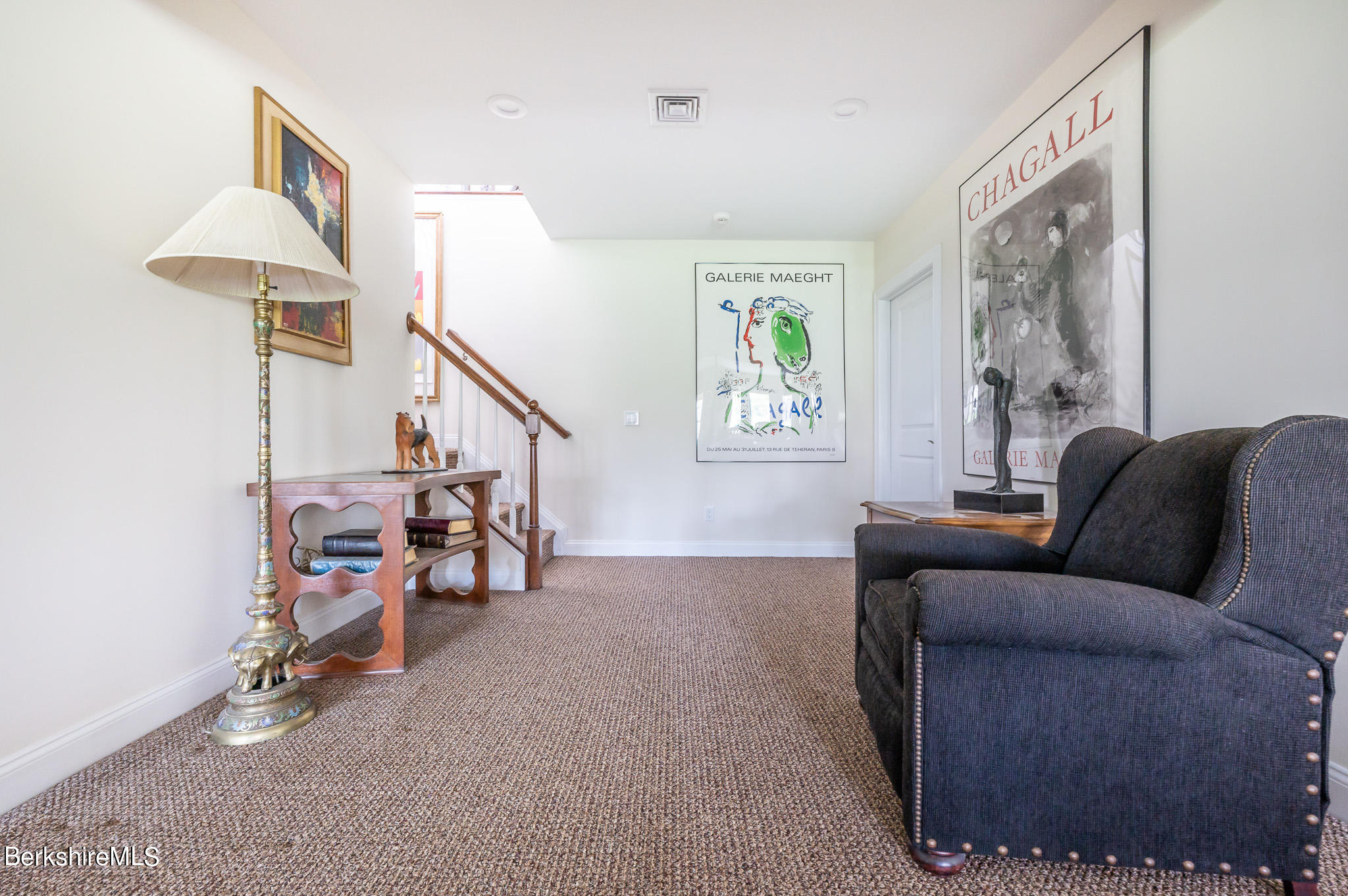 16 Burning Tree Road Great Barrington, MA 01230 - Photo 25 of 39 a living room with furniture and a window