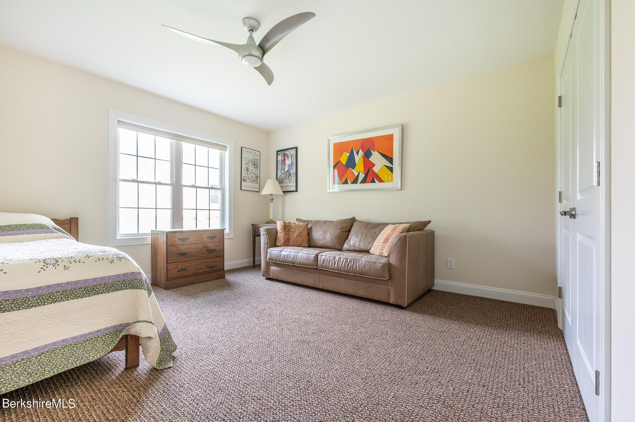 16 Burning Tree Road Great Barrington, MA 01230 - Photo 29 of 39 a bedroom with a bed and a window