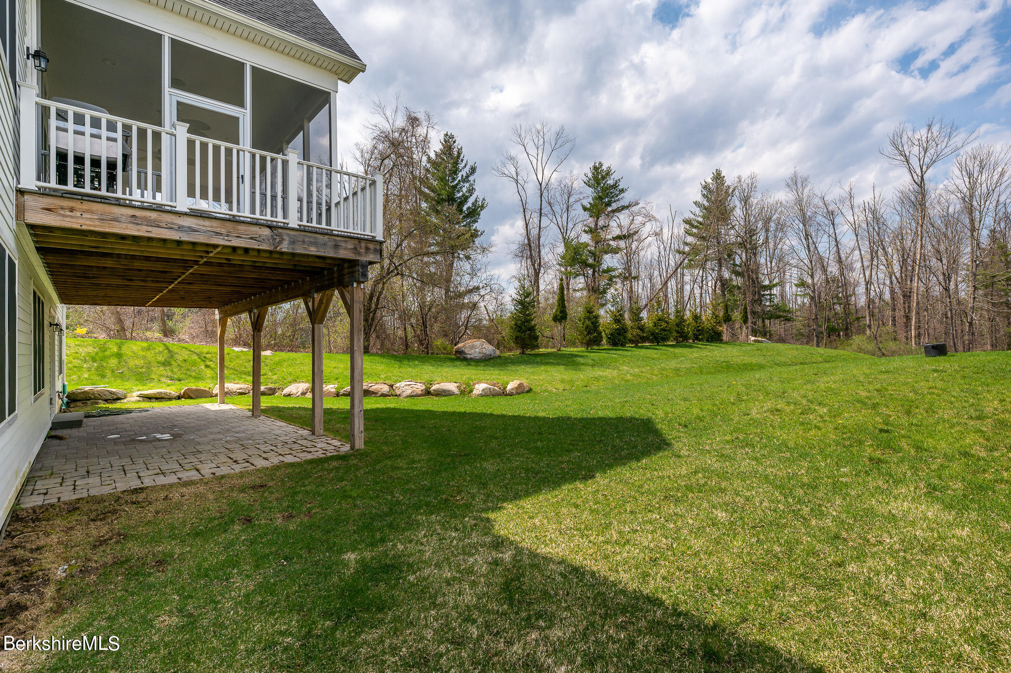 16 Burning Tree Road Great Barrington, MA 01230 - Photo 33 of 39 a view of a house with backyard and sitting area