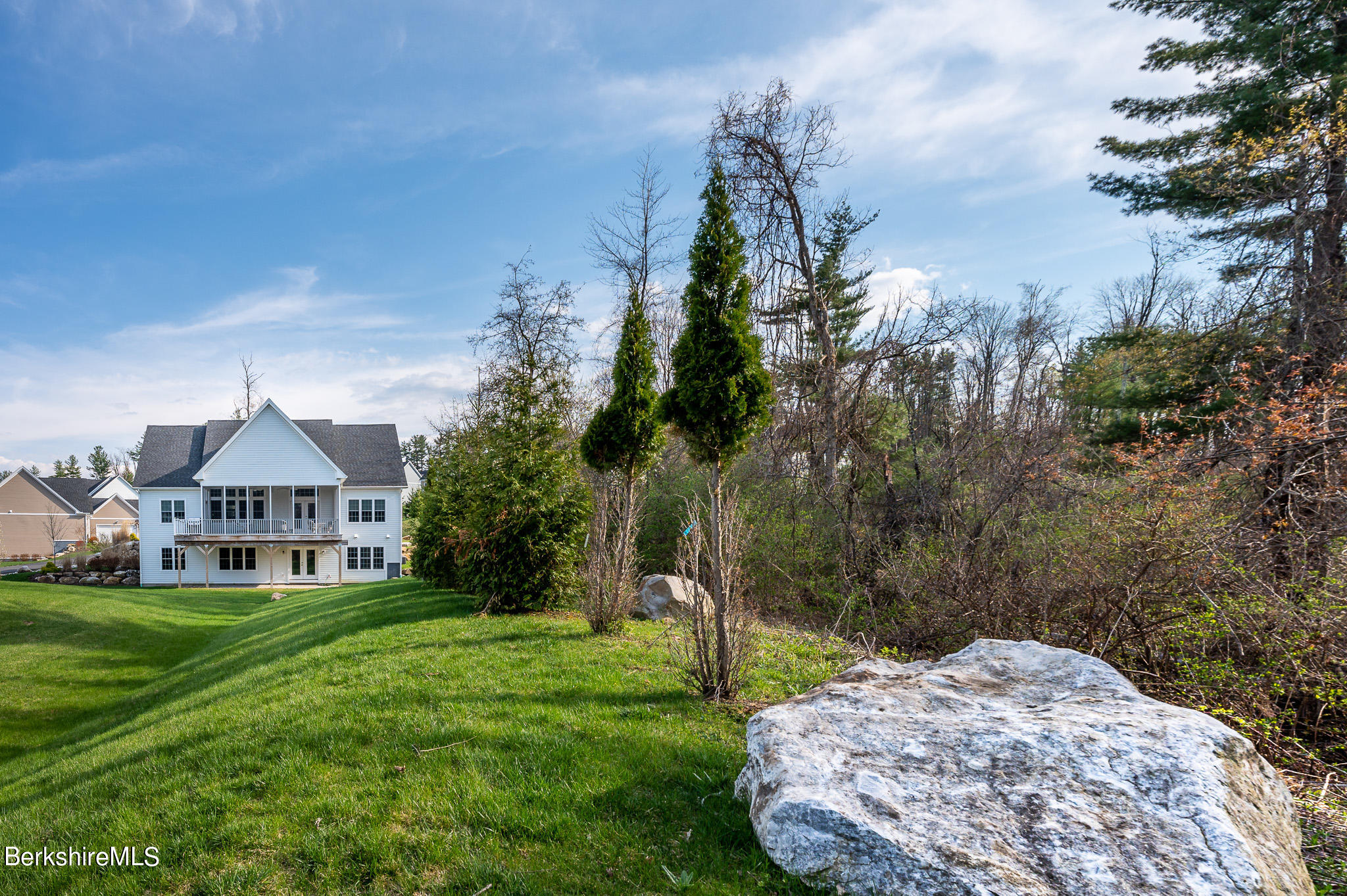 16 Burning Tree Road Great Barrington, MA 01230 - Photo 34 of 39 a view of a house with a yard