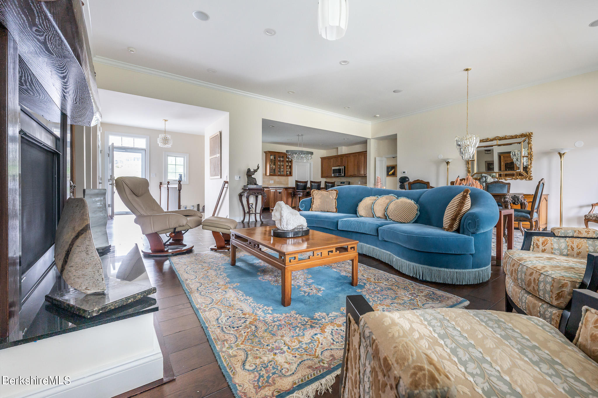 16 Burning Tree Road Great Barrington, MA 01230 - Photo 6 of 39 a living room with furniture and a flat screen tv