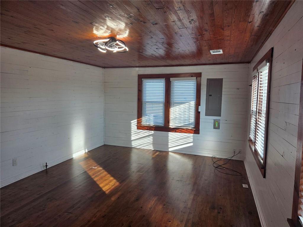 5465 Jot Em Down Road Cumming, GA 30041 - Photo 5 of 11 wooden floor in an empty room with a window