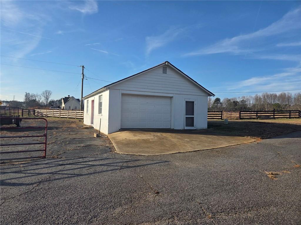 5465 Jot Em Down Road Cumming, GA 30041 - Photo 8 of 11 a backyard of a house