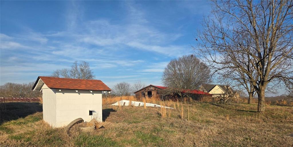 5465 Jot Em Down Road Cumming, GA 30041 - Photo 9 of 11 a view of a house with a yard