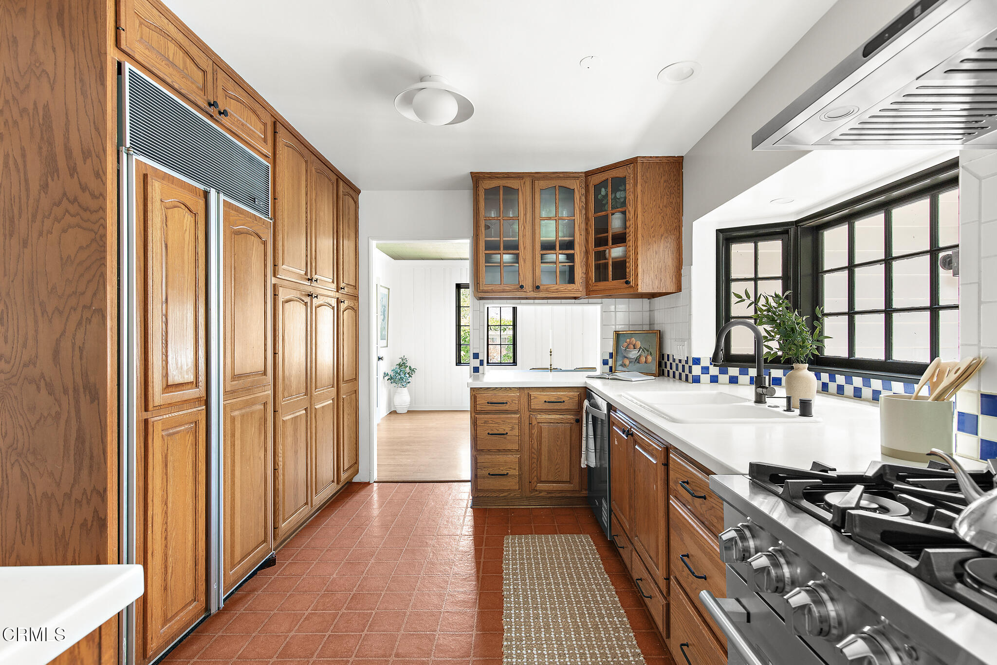 1858 Laurel Bay Drive Pasadena, CA 91105 - Photo 15 of 47 a large kitchen with stainless steel appliances a stove and a refrigerator