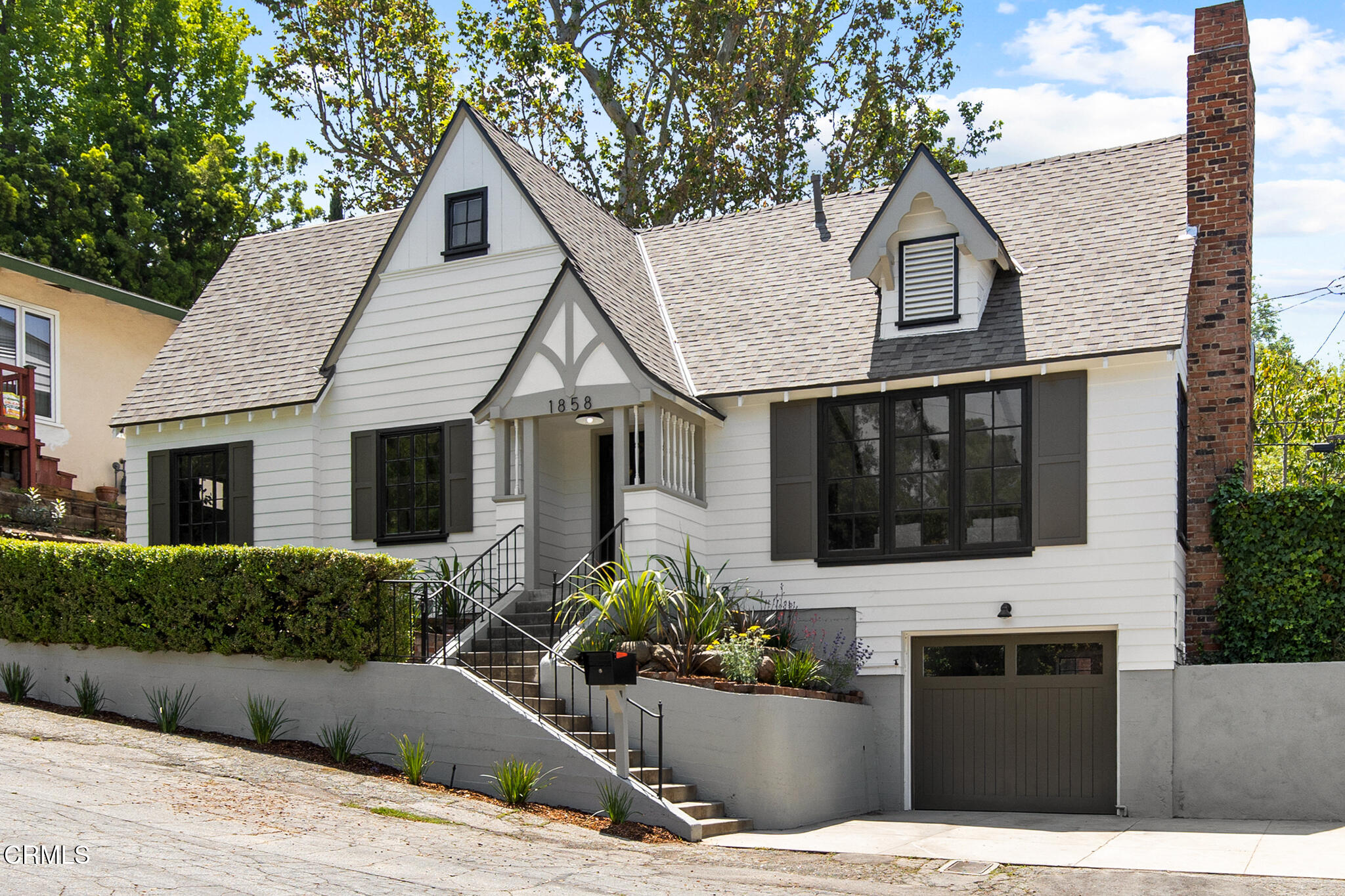1858 Laurel Bay Drive Pasadena, CA 91105 - Photo 2 of 47 a front view of a house with a yard