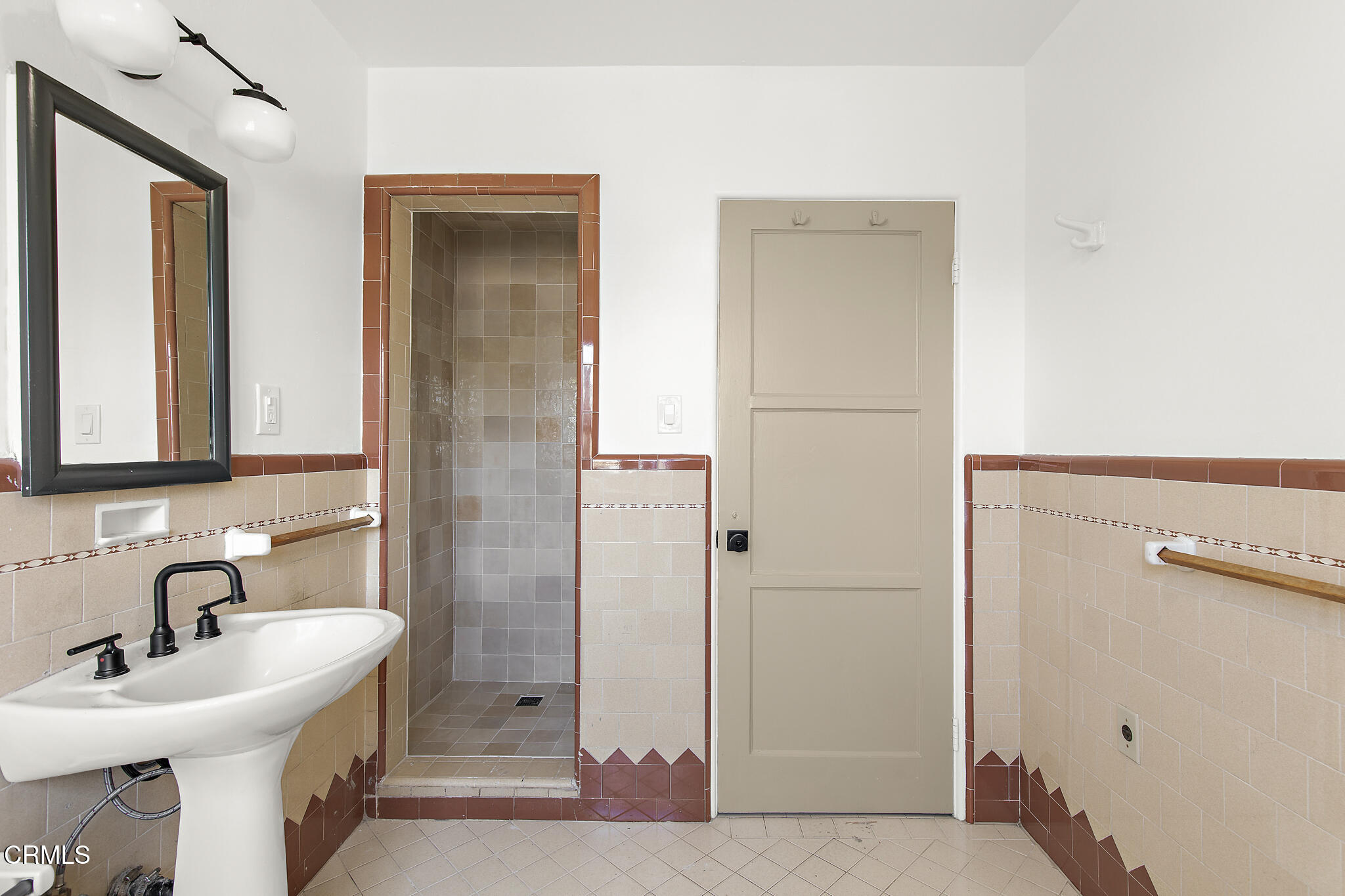 1858 Laurel Bay Drive Pasadena, CA 91105 - Photo 22 of 47 a bathroom with a double vanity sink a mirror and a shower