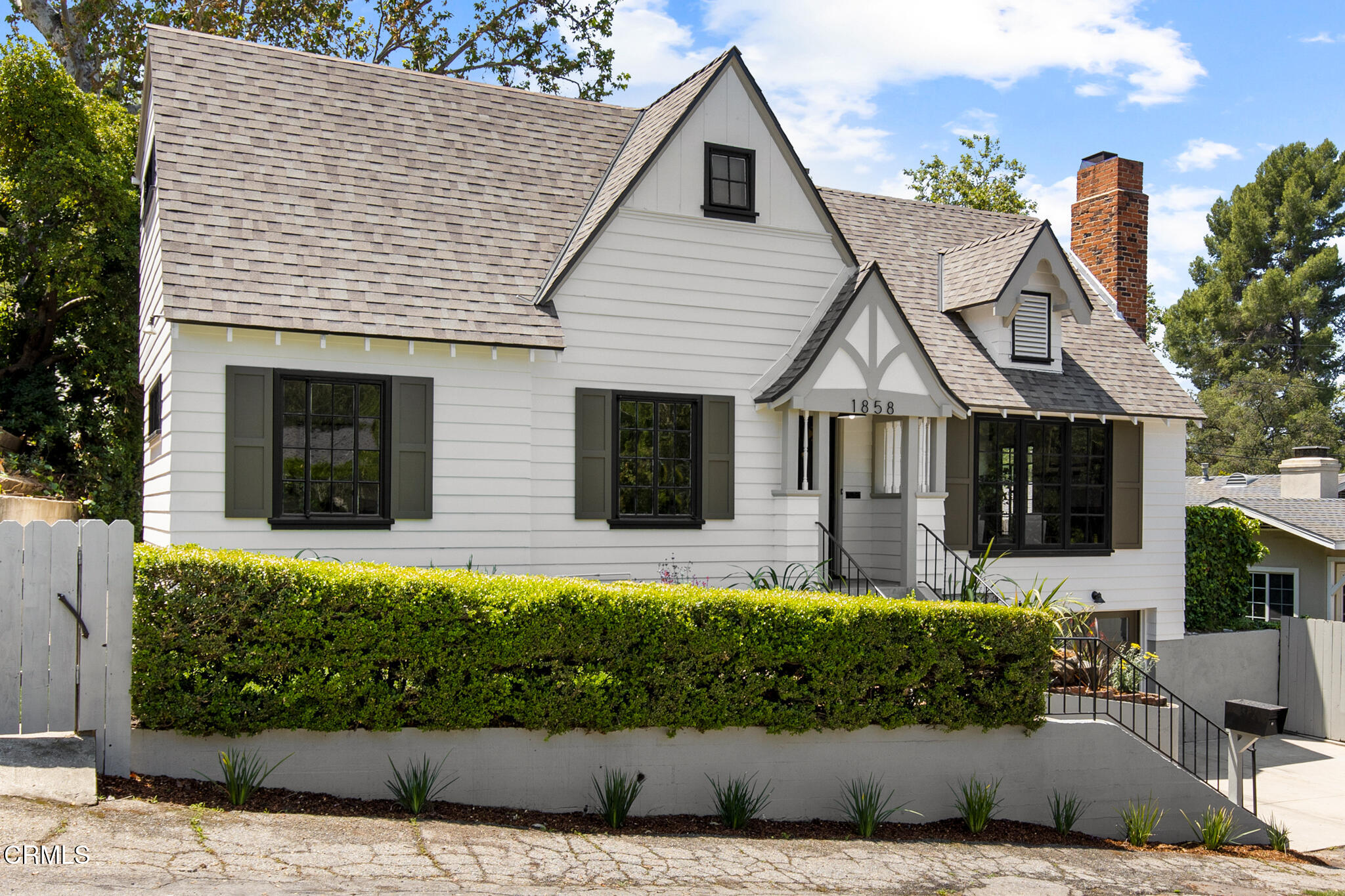 1858 Laurel Bay Drive Pasadena, CA 91105 - Photo 47 of 47 a front view of a house with a yard
