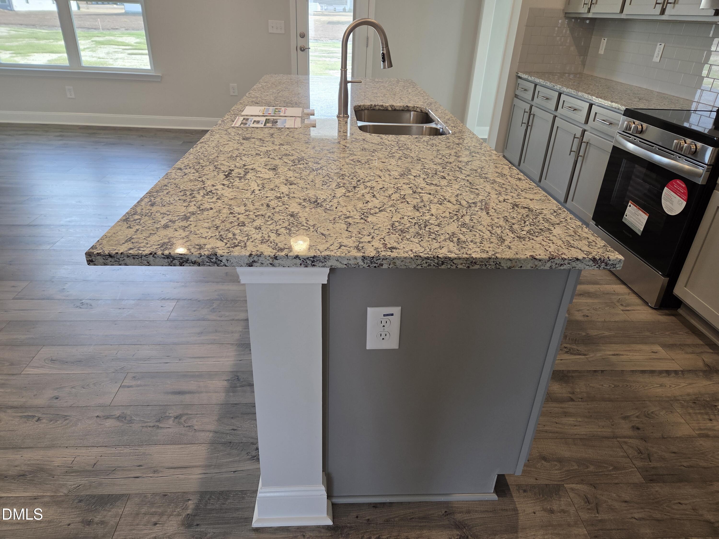 4979 Trident Maple Court Battleboro, NC 27809 - Photo 20 of 41 a view of a kitchen counter space and a window