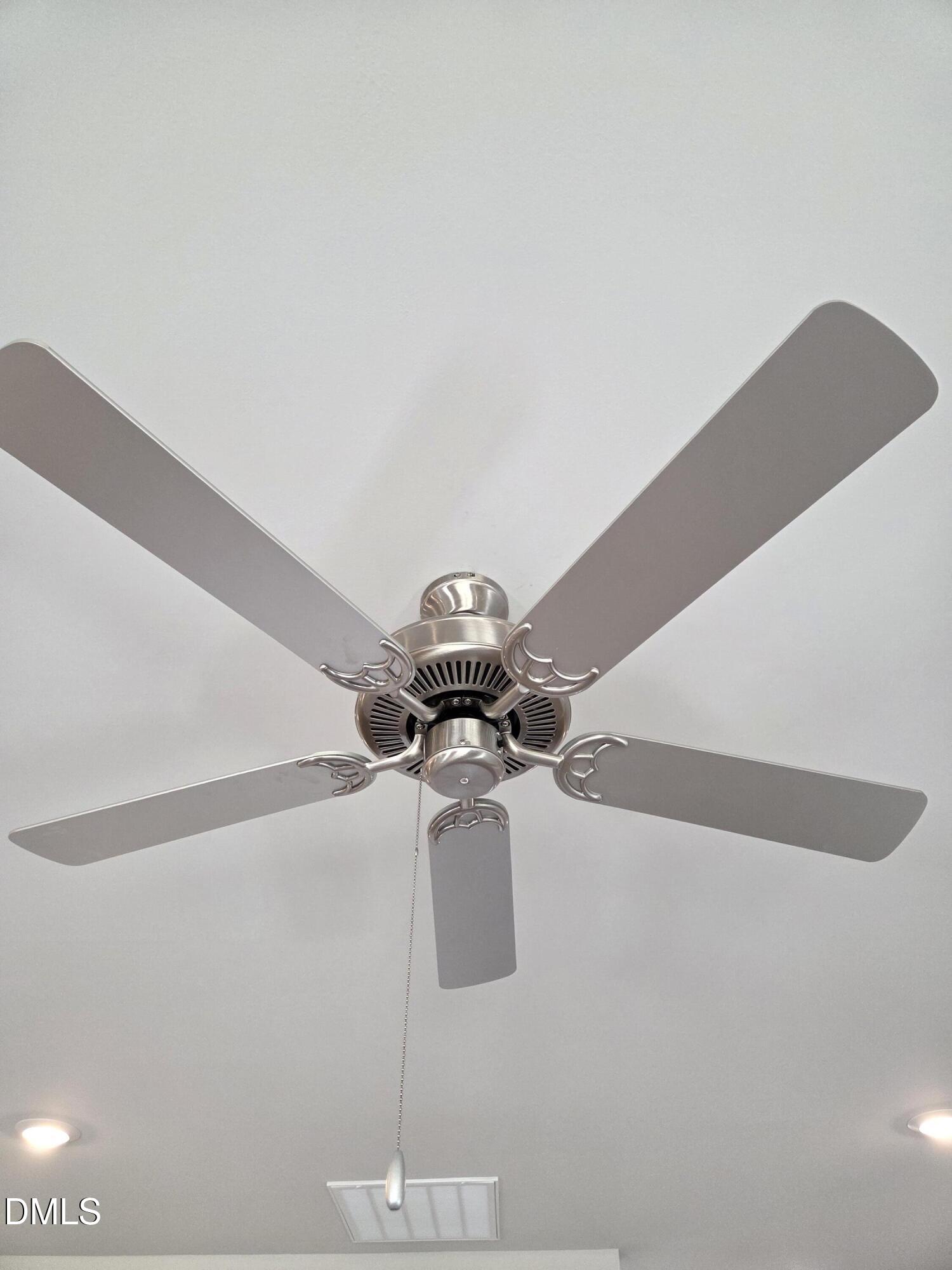 4979 Trident Maple Court Battleboro, NC 27809 - Photo 23 of 41 a vase of flowers sitting on a table