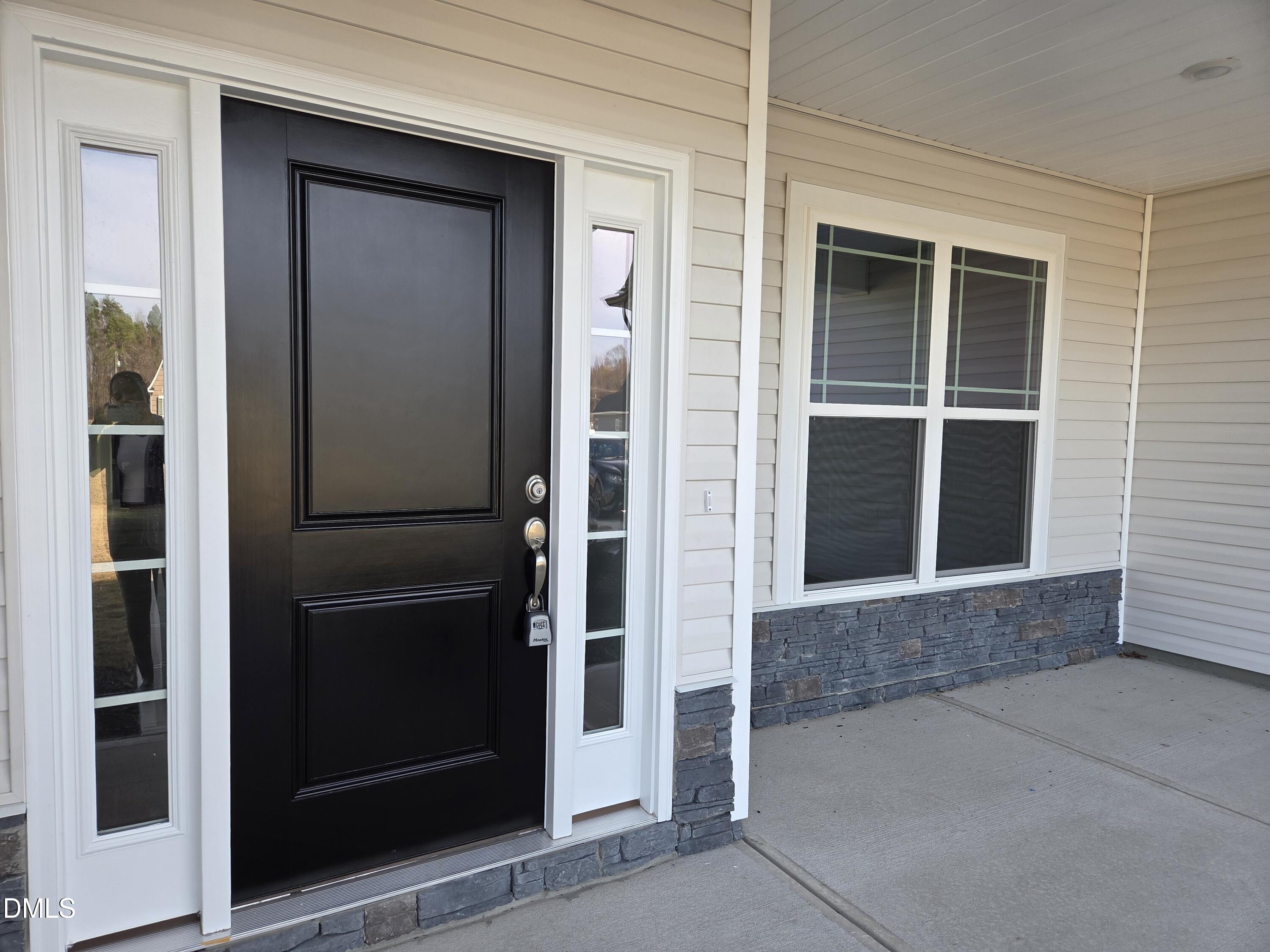 4979 Trident Maple Court Battleboro, NC 27809 - Photo 3 of 41 a view of front door of a house