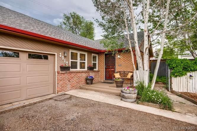 2917 Chase Street Wheat Ridge, CO 80214 - Photo 1 of 26 a view of a house with a patio