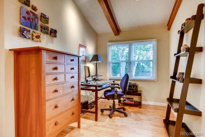 2917 Chase Street Wheat Ridge, CO 80214 - Photo 14 of 26 a view of a workspace with furniture and a window
