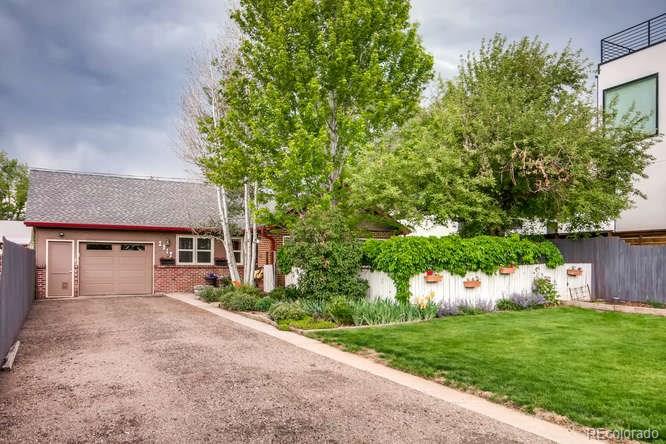 2917 Chase Street Wheat Ridge, CO 80214 - Photo 24 of 26 front view of a house with a yard
