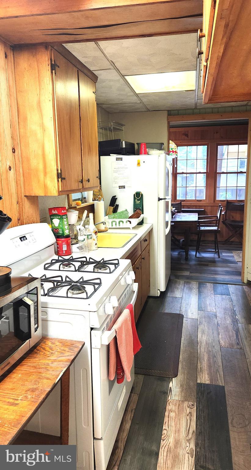 403 Boehm Avenue Mount Gretna, PA 17064 - Photo 13 of 14 a kitchen with a stove and a refrigerator
