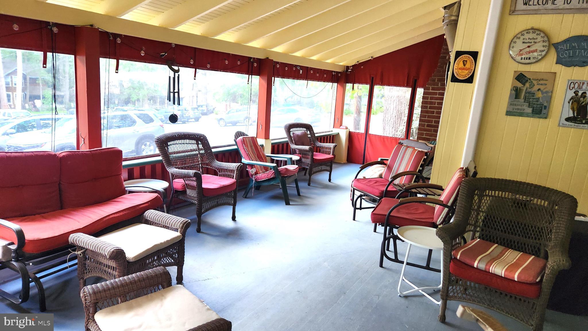 403 Boehm Avenue Mount Gretna, PA 17064 - Photo 5 of 14 a living room with furniture and large windows
