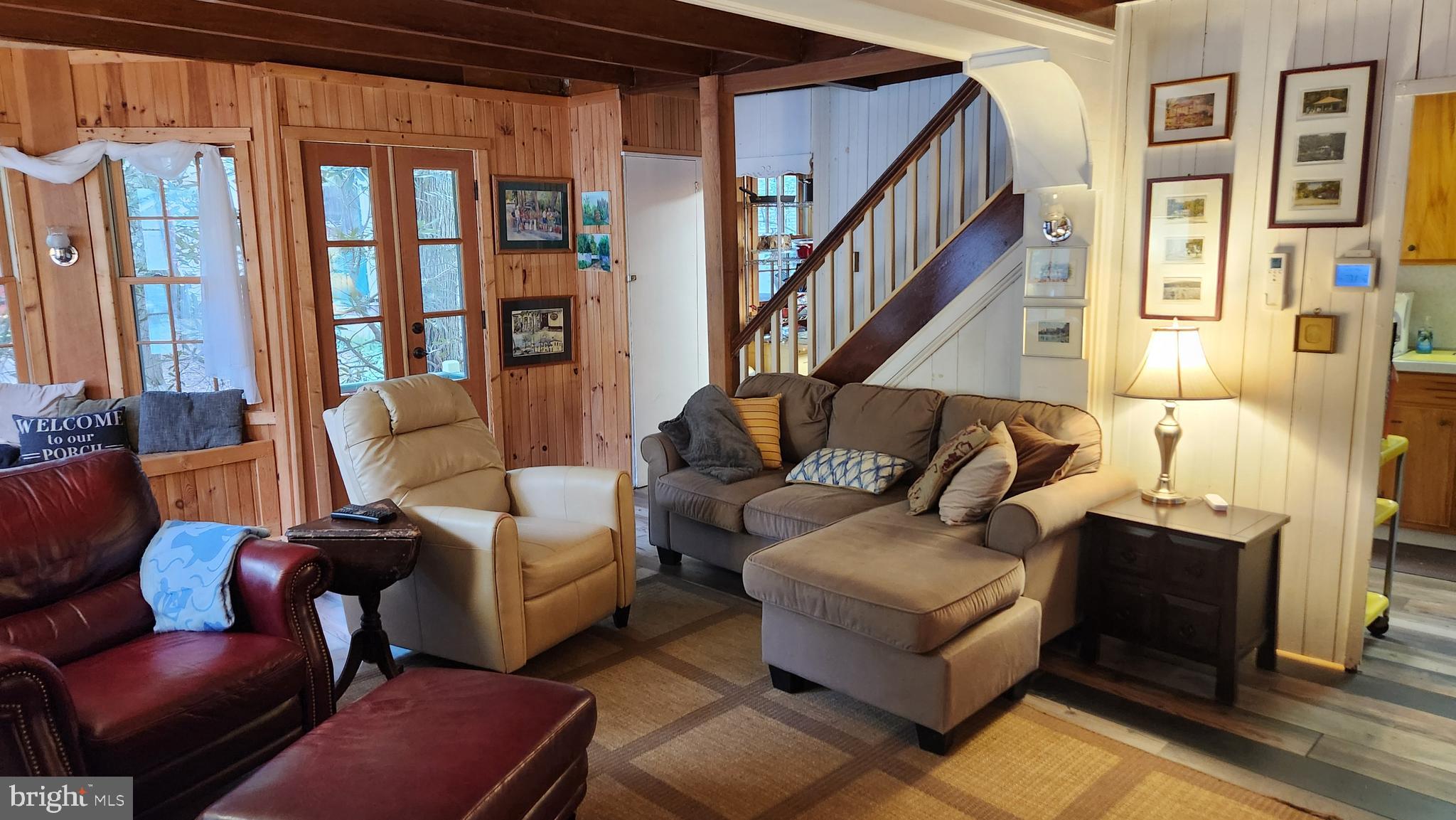 403 Boehm Avenue Mount Gretna, PA 17064 - Photo 9 of 14 a living room with furniture or couch and a large window