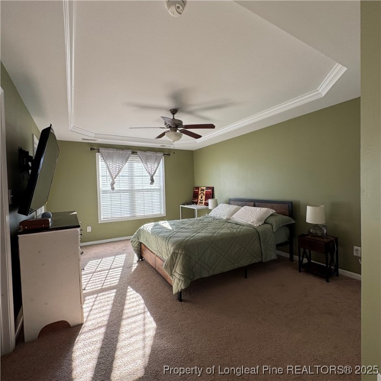 2020 Gray Goose Loop Fayetteville, NC 28306 - Photo 25 of 28 a bedroom with a bed and a flat tv screen on dresser
