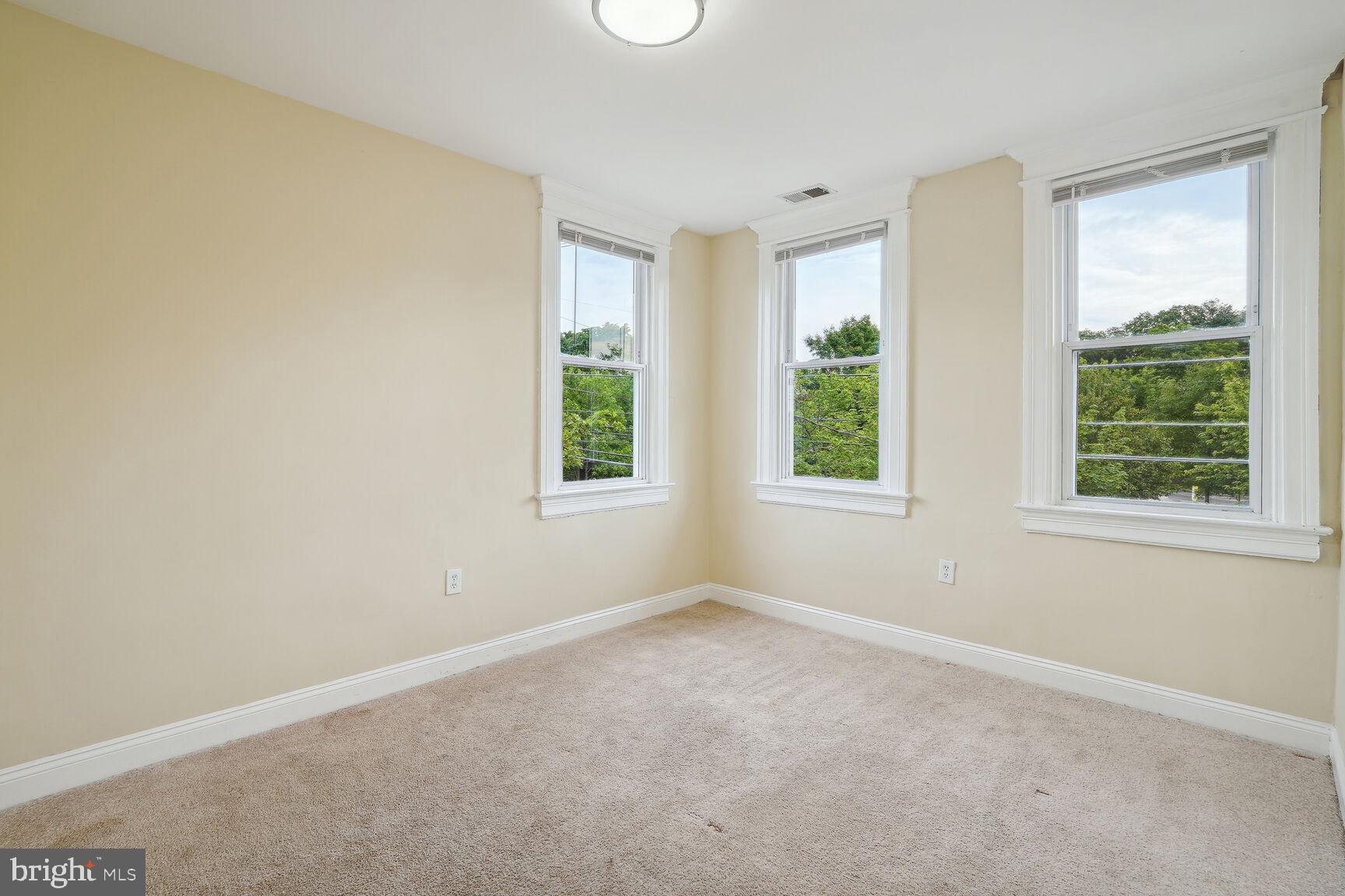 4528 4th Street Northwest Washington, DC 20011 - Photo 17 of 28 an empty room with windows