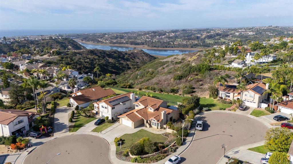 1394 Bonnie Bluff Circle Encinitas, CA 92024 - Photo 1 of 1 an aerial view of residential houses with outdoor space