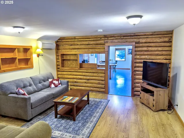 a view of a livingroom with furniture and window