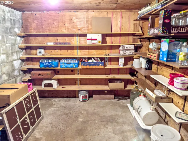 a wooden bench sitting in the middle of a snow