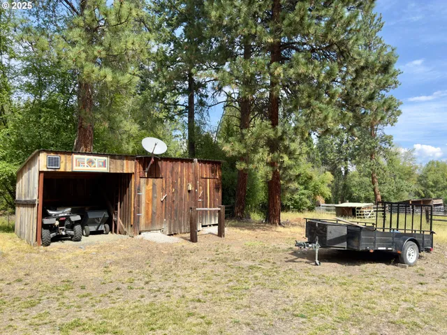 a view of swimming pool with a yard