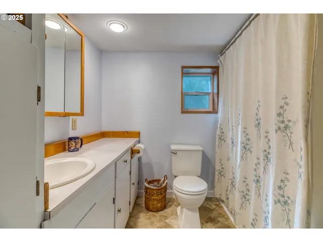 a aerial view of a house with a yard