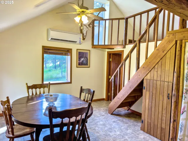 a view of a dining room with furniture