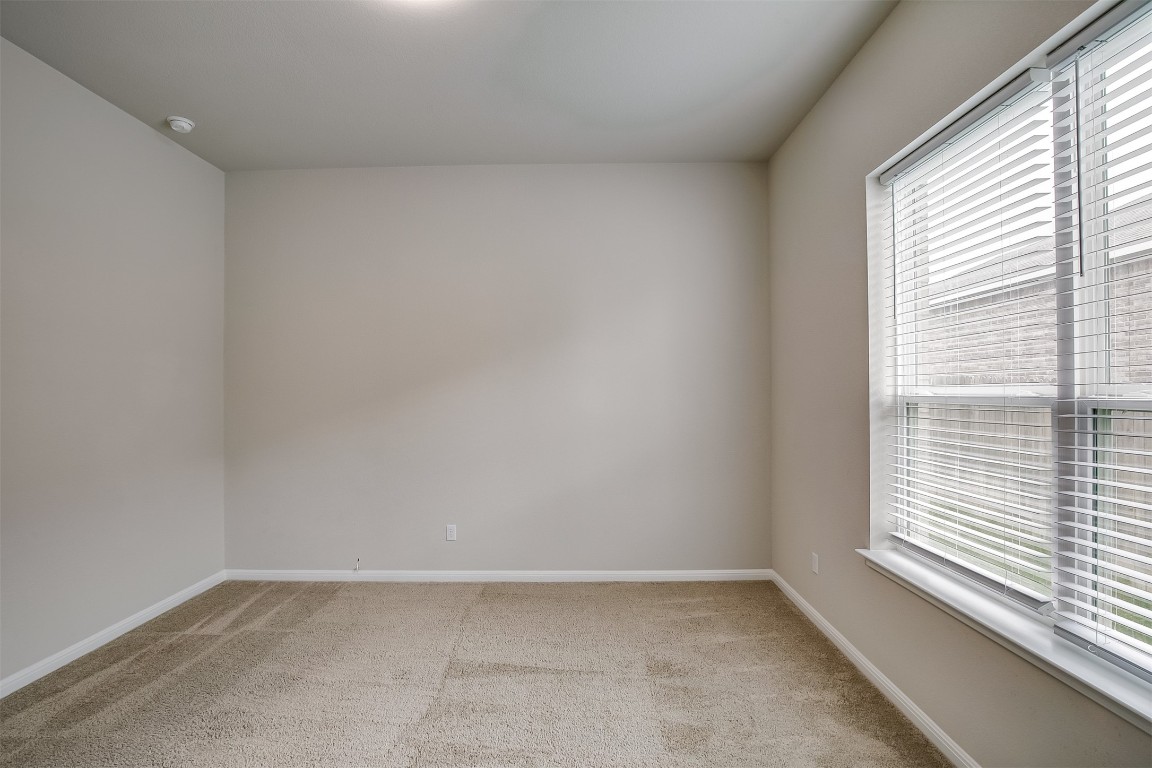 128 Ridgeview Court Georgetown, TX 78628 - Photo 16 of 22 a view of an empty room and a window