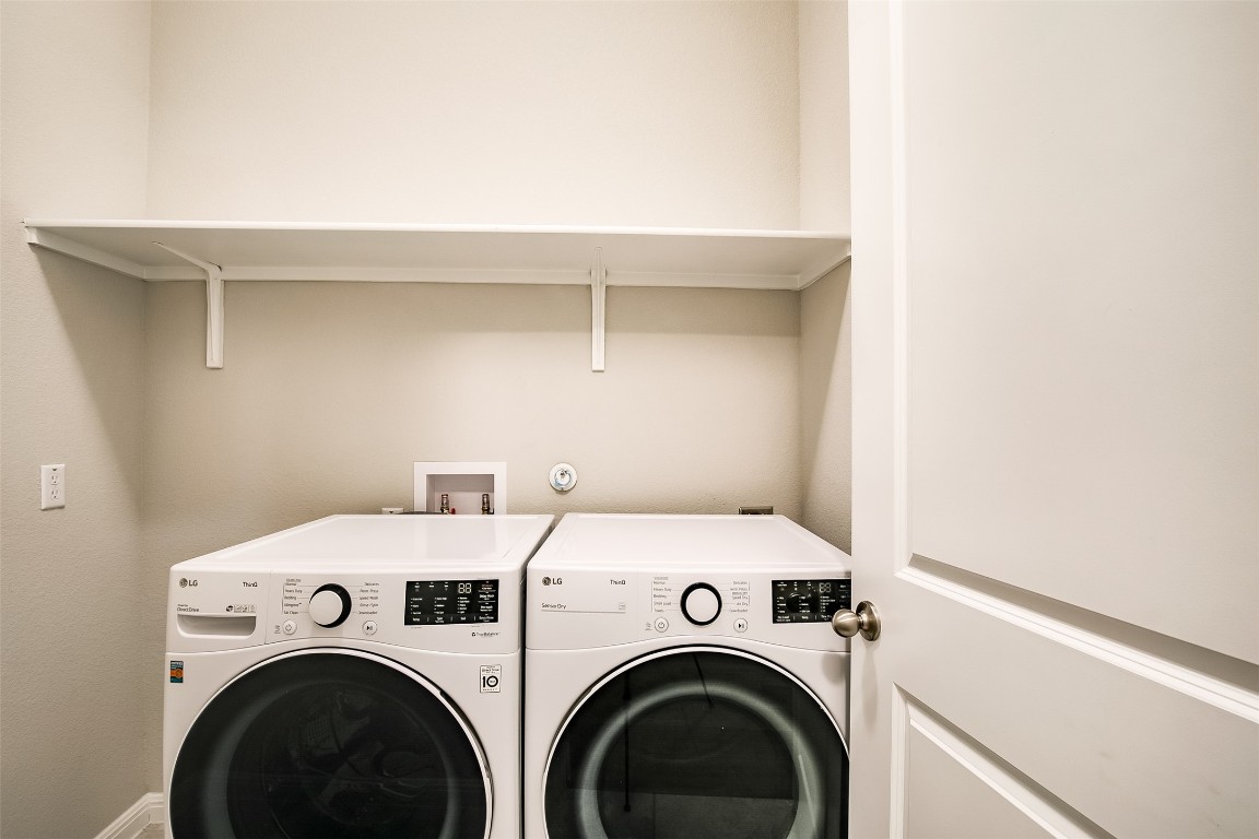128 Ridgeview Court Georgetown, TX 78628 - Photo 17 of 22 a utility room with dryer and washer